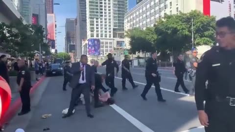 Leftist Gets Taken Down After Interfering With Motorcade