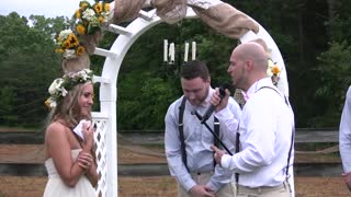 Groom sings 'All Of Me' to bride at their wedding