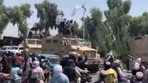 Taliban in US Uniforms Throw Military Victory Parade Riding in US Military Equipment with US Guns