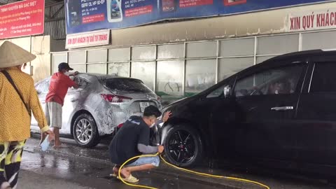 Car washing in asian country.