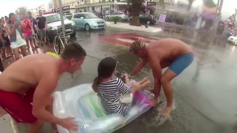 Transporting people on the streets of Ibiza after the big rain