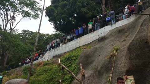 Venezuelans collecting clean spring water on Caracas mountain (2019)