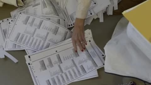 The second video was taken at a table where ballots were being counted in Helena Twp.