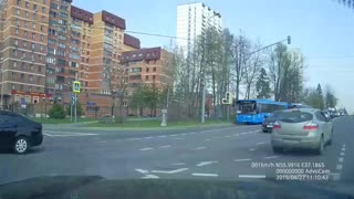 Russian Cyclist Collides with a Car