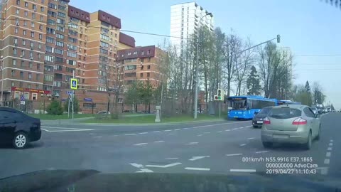 Russian Cyclist Collides with a Car