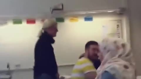 Swedish Teacher screams and Taunts Muslim Girl
