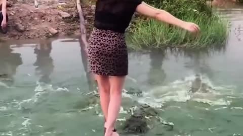 Dangerous Human bridge with crocos
