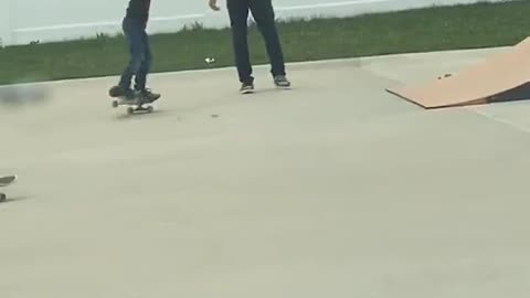Kind Dude Teaches Kid To Skate Down Ramp