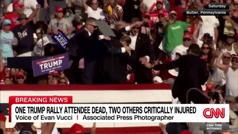 Hear from photographer who captured viral photo of Trump injured at rally