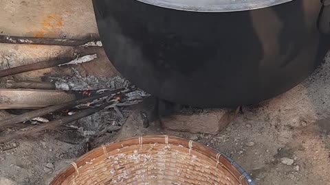 Indian Village people cooking rice