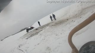 Men Work to Rescue Horses from Frozen Pond