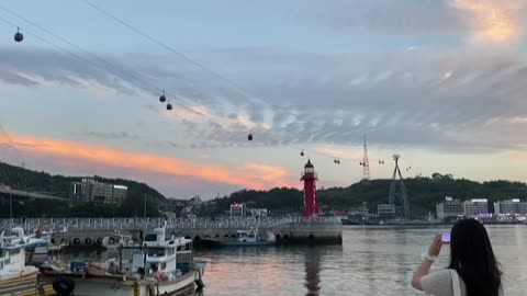 A person watching the sunset sea