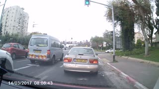 Reckless Biker Has Close Call With Turning Car