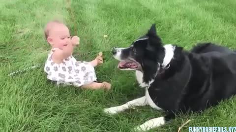 Adorably Baby Playing ball with Puppy