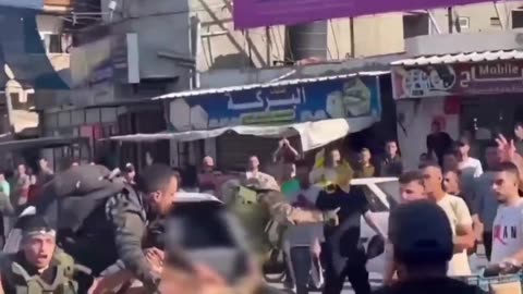 These are the “innocent Palestinian civilians” cheering to the public display and lynching