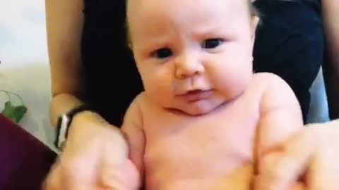 This baby has the funniest facial expressions during a TikTok video