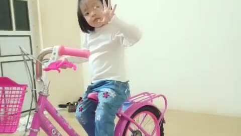 cute baby with the bike