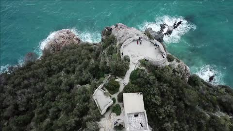 drone flying over baia dei saraceni in varigotti liguria italy