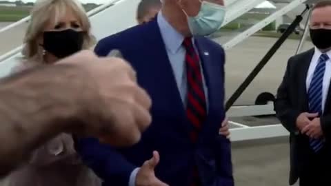 Jill Biden Caught Physically Moving Dementia Patient Joe at Airport Who Is Stuck With Hand Out