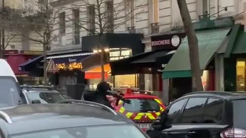 Hostages' situation in Paris man armed with a knife demanding he speaks to the Justice Minister,