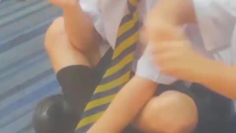 Cute Pakistani kid is very shy during study in nursery class