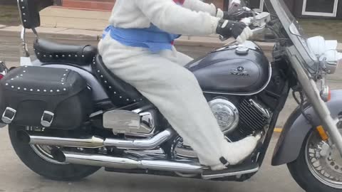 Easter Bunny Driving Motorcycle Around Canada