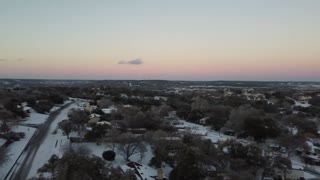 Snowy hill country sunset