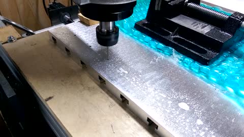 CNC drilling holes for new aluminum T-Slot bed