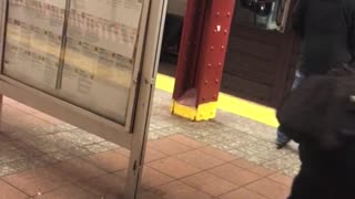 White pants guy dances weird in subway terminal