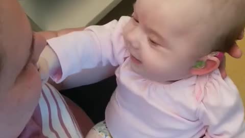 Baby Born Nearly Deaf Hears Her Parents for the First Time