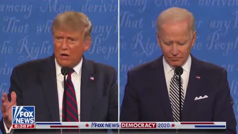 Look under Biden's collar what do you see?