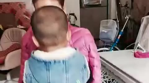 She may be armless, but she takes the best care of her son