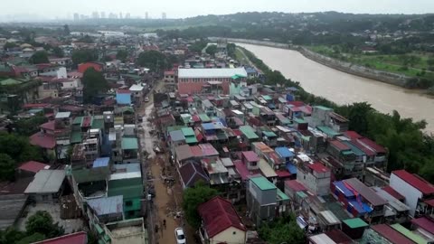 Residents return to Manila streets devastated by Typhoon Gaemi