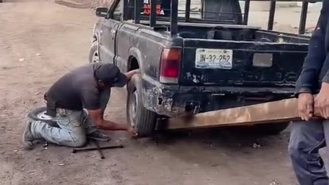 How to change a tire without a jack?