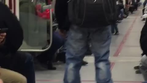 Man hover boards through subway