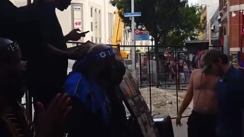 Soy Boy Messes with Black Hebrew Israelites,Wigs out when arrested While Crowd Mocks Him