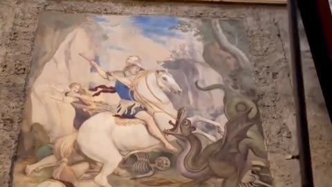 Hidden painting found in the Church of Saint George Maggiore in St. George slaying a dragon.