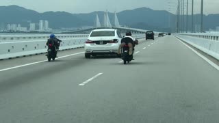 Malaysian Motorists Perform Group Stunt over Penang Bridge