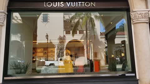 music video - Louis Vuitton storefront in Palm Beach, Florida