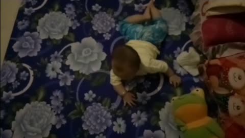Baby is learning to crawl for the first time
