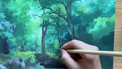 Drawing a hot summer forest with a paintbrush