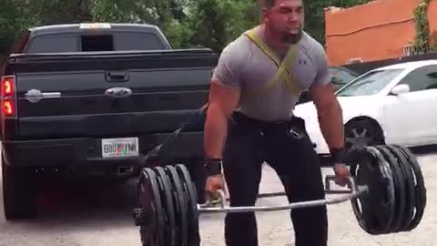 Man Pulls Truck While Lifting 415lbs