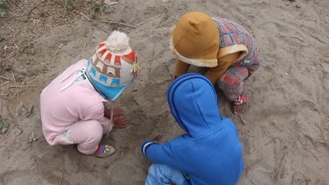 kids in mud enjoying playing