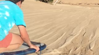 Sand dune surfing