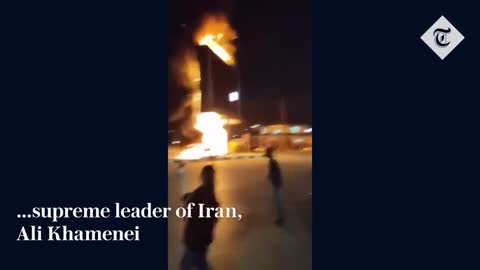 Police officer set on fire as Iran protests escalate