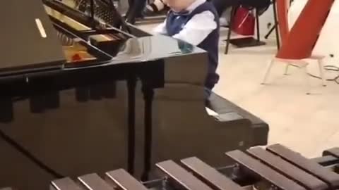 Amazing kid playing piano