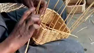 How basketry weaving is done.