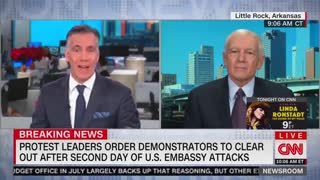 Gen. Wesley Clark throws his ringing phone while on camera