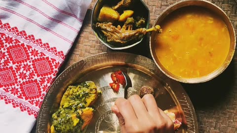 Preparing an Assamese Ethnic platter in India