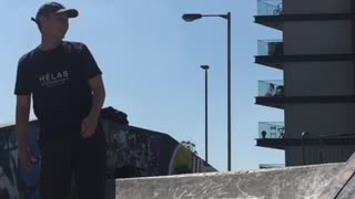 Guy skateboard up half pipe hits stomach on top of ramp